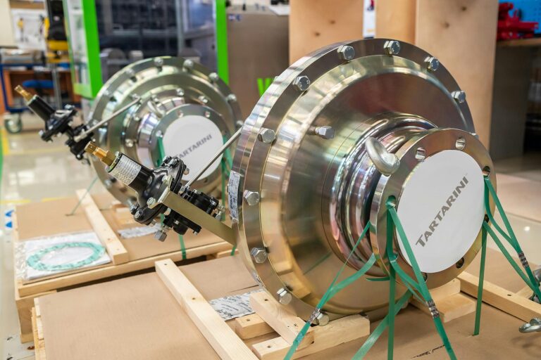 Close-up of precision machinery in an industrial factory showcasing engineering and metal work.